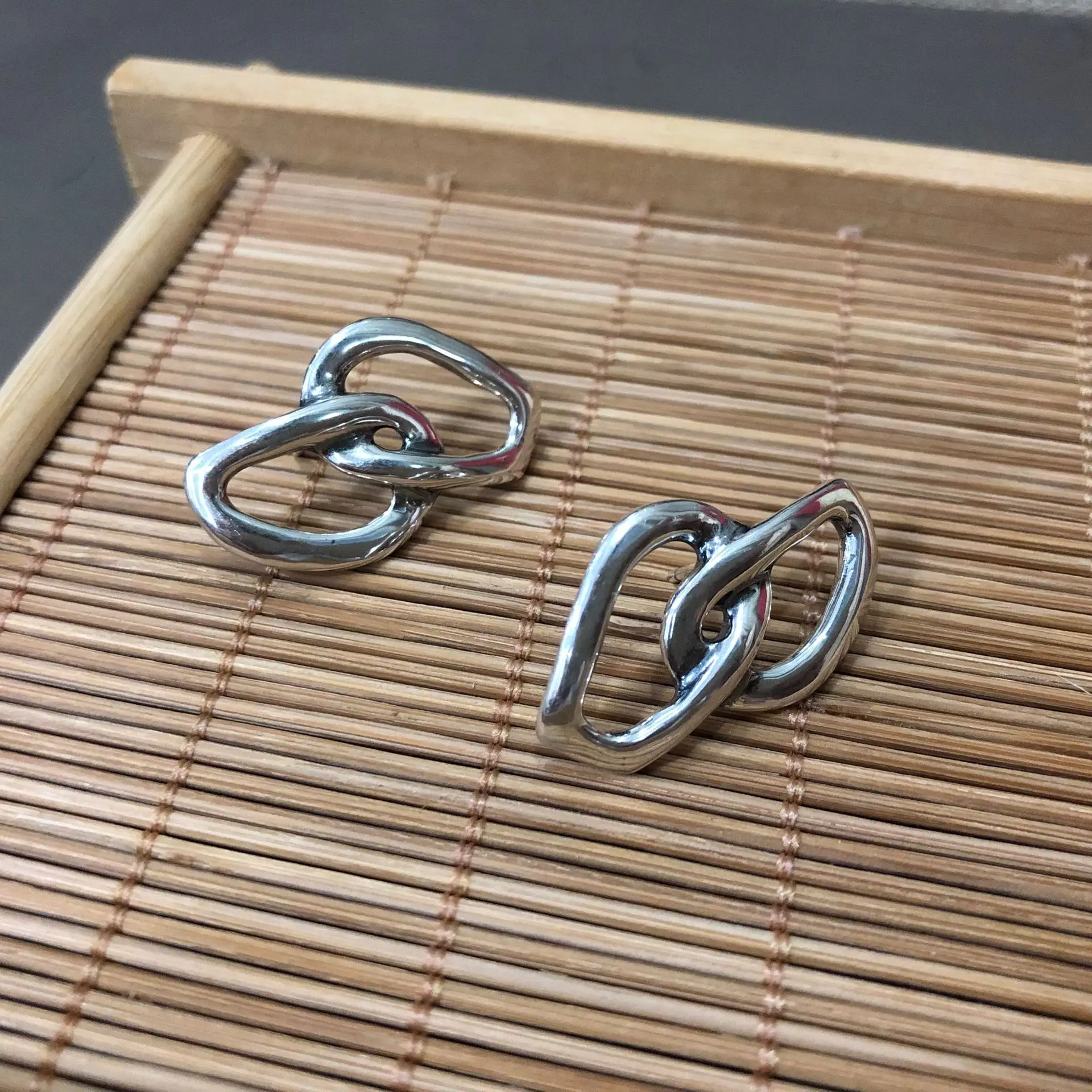 2022 Hot Fashion Women's Silver gold Geometric Magic Eye earrings UNO 50 unique European and American style