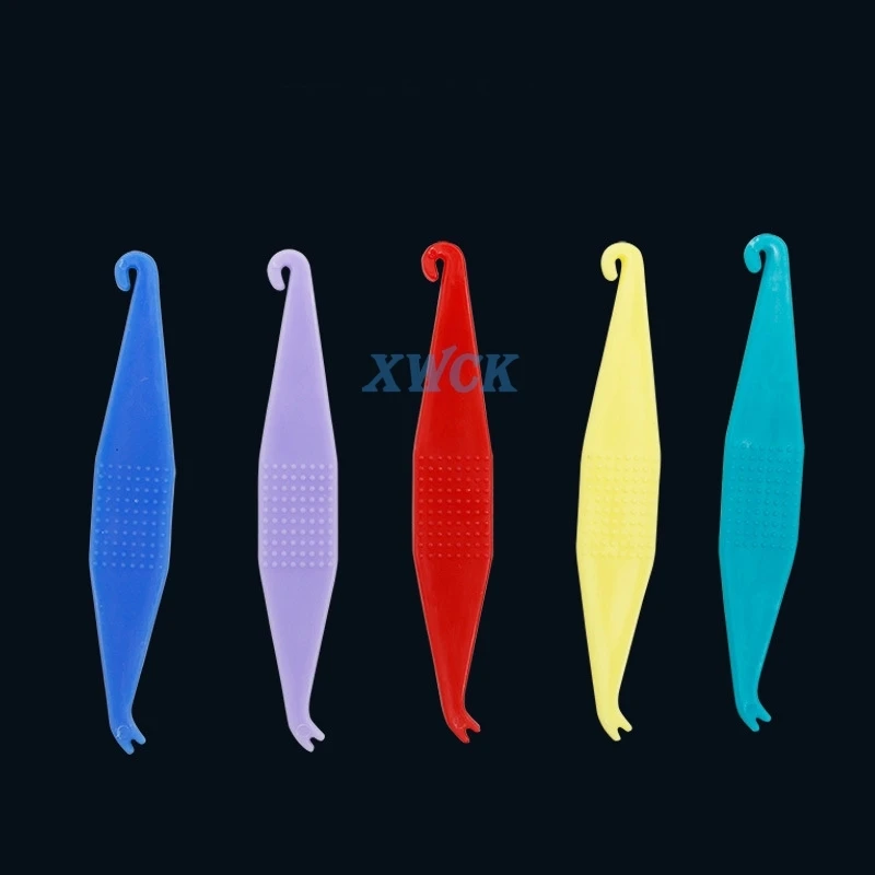 

New 50pc Dental Disposable Orthodontic Elastic Placer for Braces Bands Orthodontic Rubber Ligature Tie Retractor Tooth Care tool