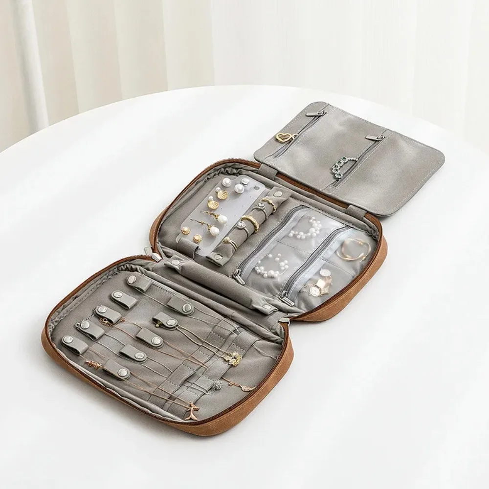 

Jewelry jewelry storage bag for women's travel portable large capacity earrings earrings rings necklaces leather storage box