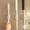 Practical Plastic Mop Broom Holder Self Adhesive Wall Mounted Electric Toothbrush Holder White Waterproof Mop Clip for Kitchen 1