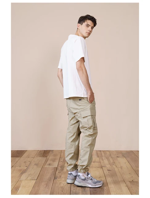 Khaki cargo military pants with tapered bottoms