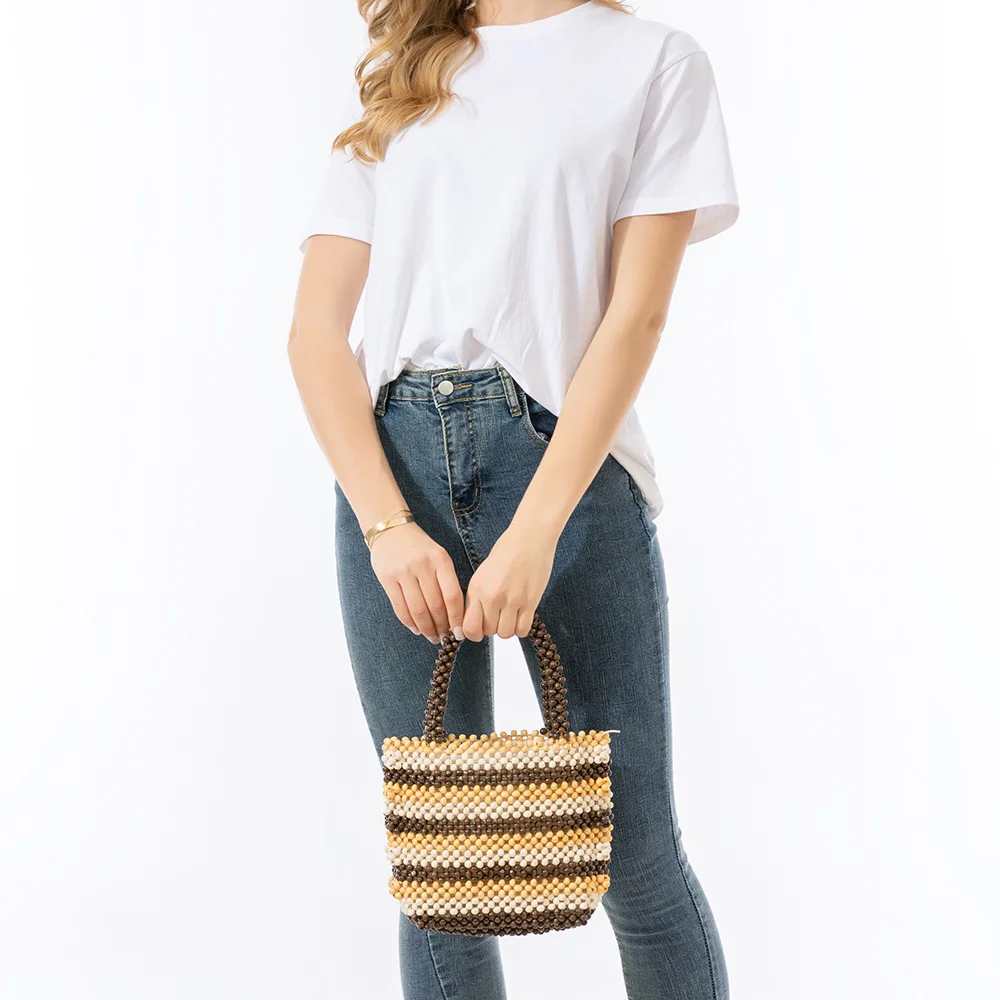 NEW wood bead hand-woven totes bag summer women's bamboo hollowed out clutch female Reticulate netted canvas beach handbag