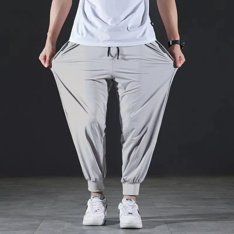 여름 빠른 건조 얼음 실크 캐주얼 바지 남성용 초박형 탄성 9 점 바지 루즈 드레이프 솔리드 빔 피트 바지 7XL