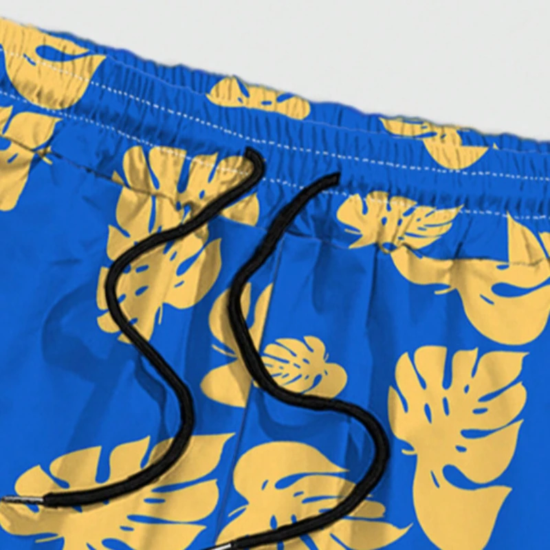 New Summer Mens Swimming Trunks Loose Sports Breathable Shorts Leaves Pattern Blue Color Quick Drying Drawstring Home Vacation
