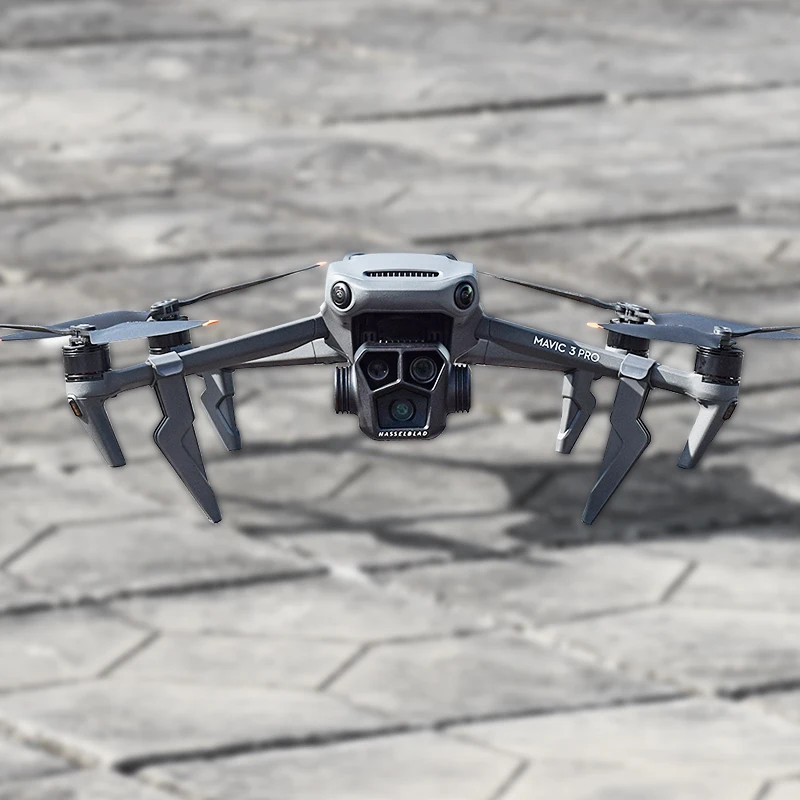 Train d'atterrissage surélevé pour DJI Mini 3 Pro - Protection cardan et corps, installé sur drone posé sur herbe.