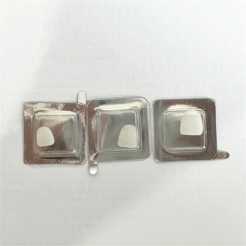 Impiallacciatura di porcellana composita dentale Sbiancamento dei denti anteriori Impiallacciature superiori inferiori Materiali per il restauro di odontoiatria bianco brillante - immagine 6