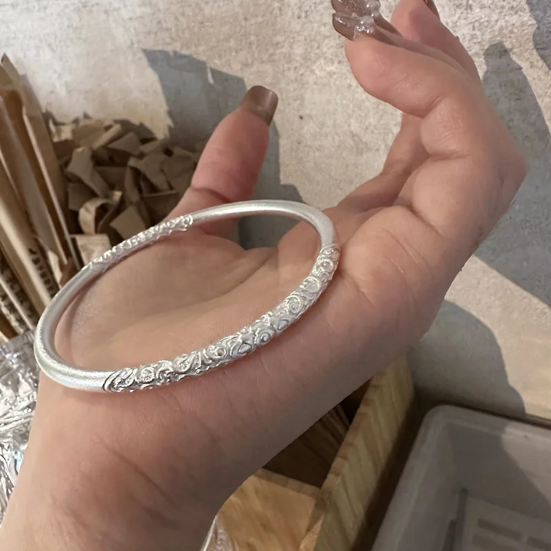 Sterling silver 999 bauhinia Steamed rolls grass pattern closed lady bracelet, national style ancient silver senior jewelry gift