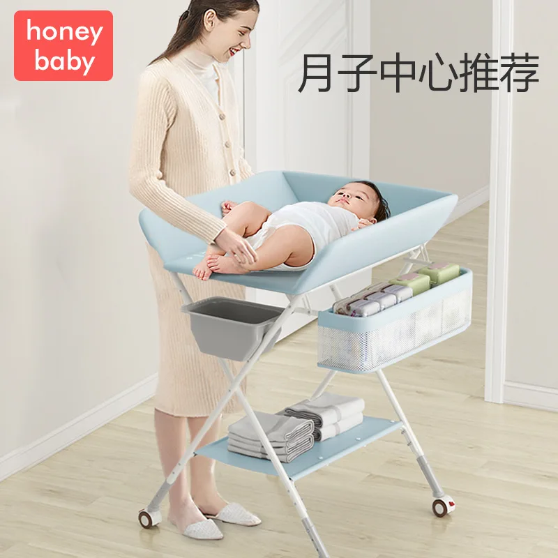  Sweeby Cambiador portátil para bebé con bañera, cambiador de  pañales plegable y cambiador de bebé con ruedas, impermeable, color blanco  : Bebés