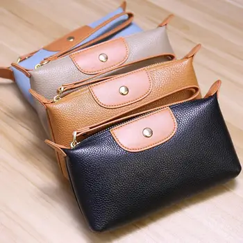 Il nuovo portafoglio da donna alla moda in morbida pelle con colori a contrasto è una borsa da polso portatile, di nicchia e versatile.