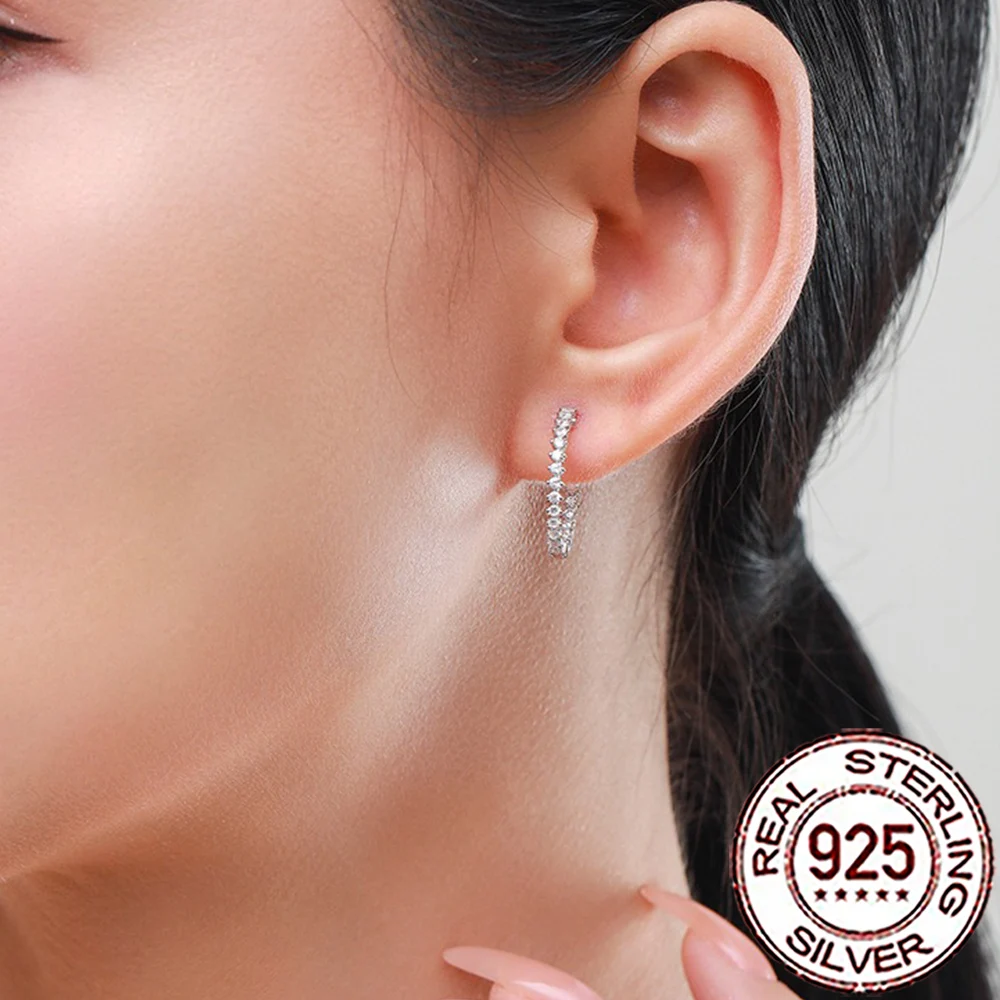 Model wearing the earrings