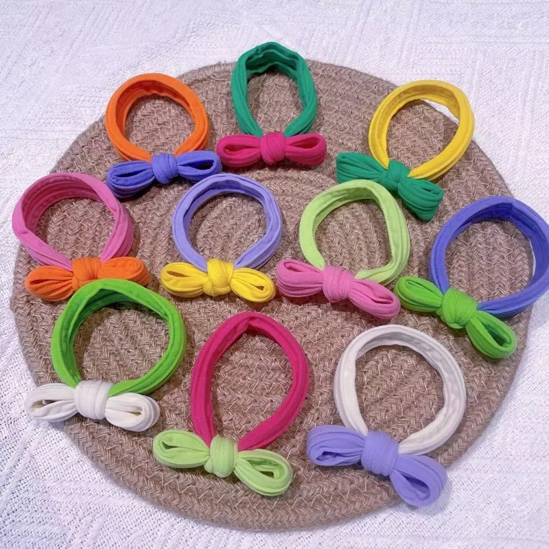 alt="The 10PCS Pastel Bow Scrunchies, stylish velvet hair accessories.