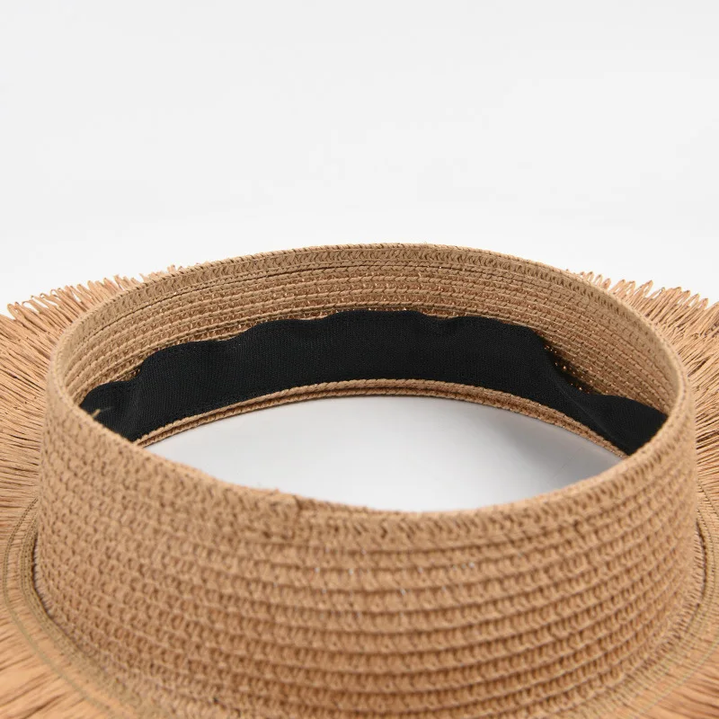 2023 Nowa moda damska Duże okapy Słońce Lato Projektant Plaża Ochrona UV Pusty Top Tassel Słomkowy kapelusz Hurtownie_voghion.com