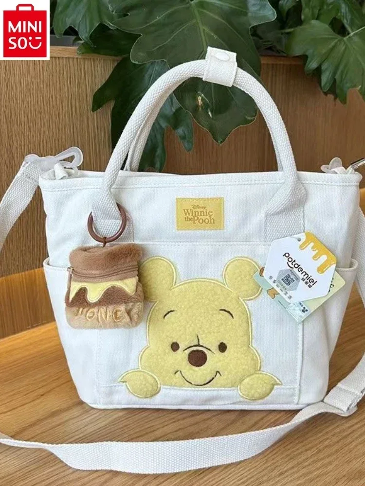 MINISO Disney Fashion Canvas Large Capacity Handbag Cute Cartoon Winnie Bear Multi functional Women's Crossbody Bag