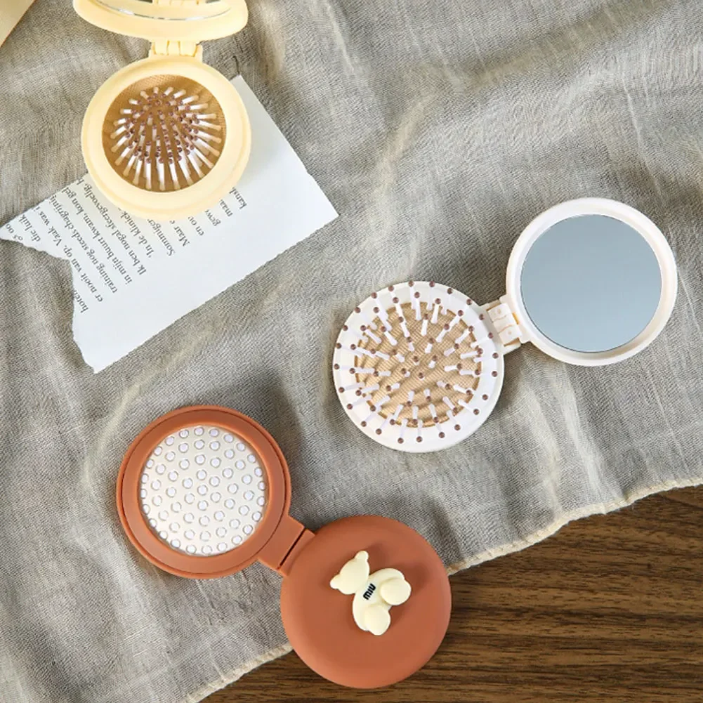 Description Picture 6 of itemCute Folding Air Bag Comb with Mirror Compact Pocket Size Portable Travel Hair Brush Cosmetic Mirror Head Massager Relax