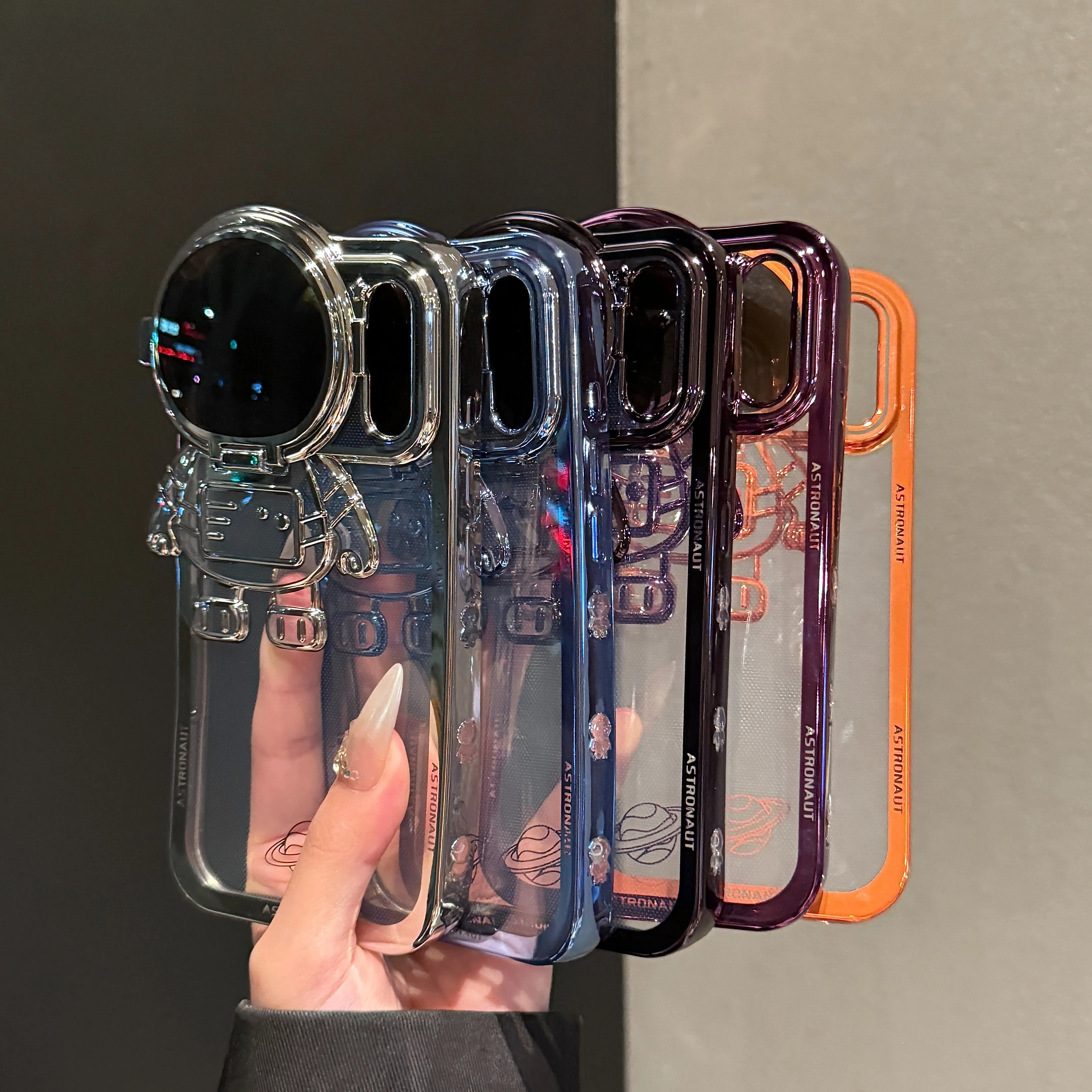 Cosmic Cartoon Electroplated Phone Case with Camera Protection and Built-in Stand