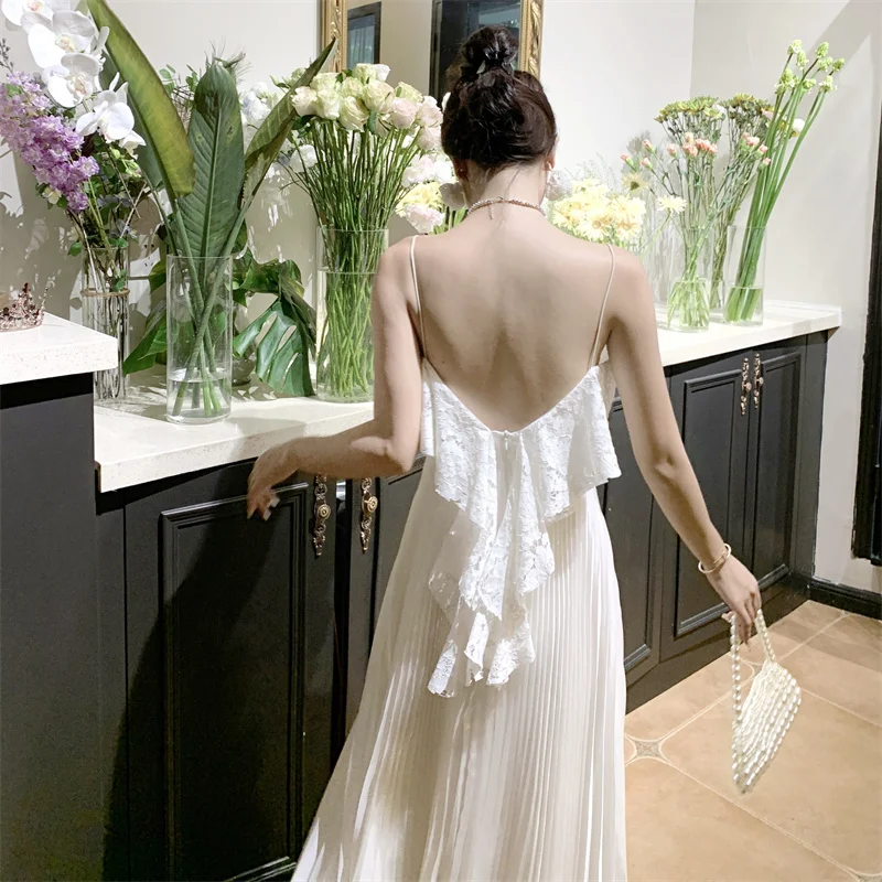 

Sexy Summer Backless White Dresses 2023 New Spring Sleeveless V-neck Ruffled Pleated Dress Fashion Vestidos De Tricô Femenino