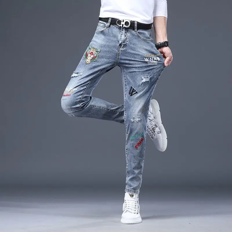 Hot Sale Men's Luxury Jeans Streetwear Denim Pants Punk Distressed Hole Tiger Embroidery Patches Stretch Skinny Ripped Trouser
