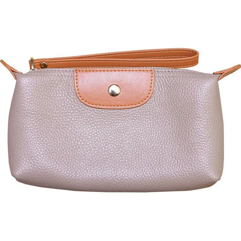 Il nuovo portafoglio da donna alla moda in morbida pelle con colori a contrasto è una borsa da polso portatile, di nicchia e versatile. - immagine 6