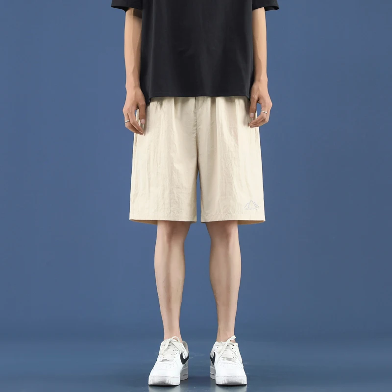 Minimalist Trendy Versatile Summer Embroidery Elastic Waist Pocket Drawstring Men's New Loose and Casual Sports Beach Shorts