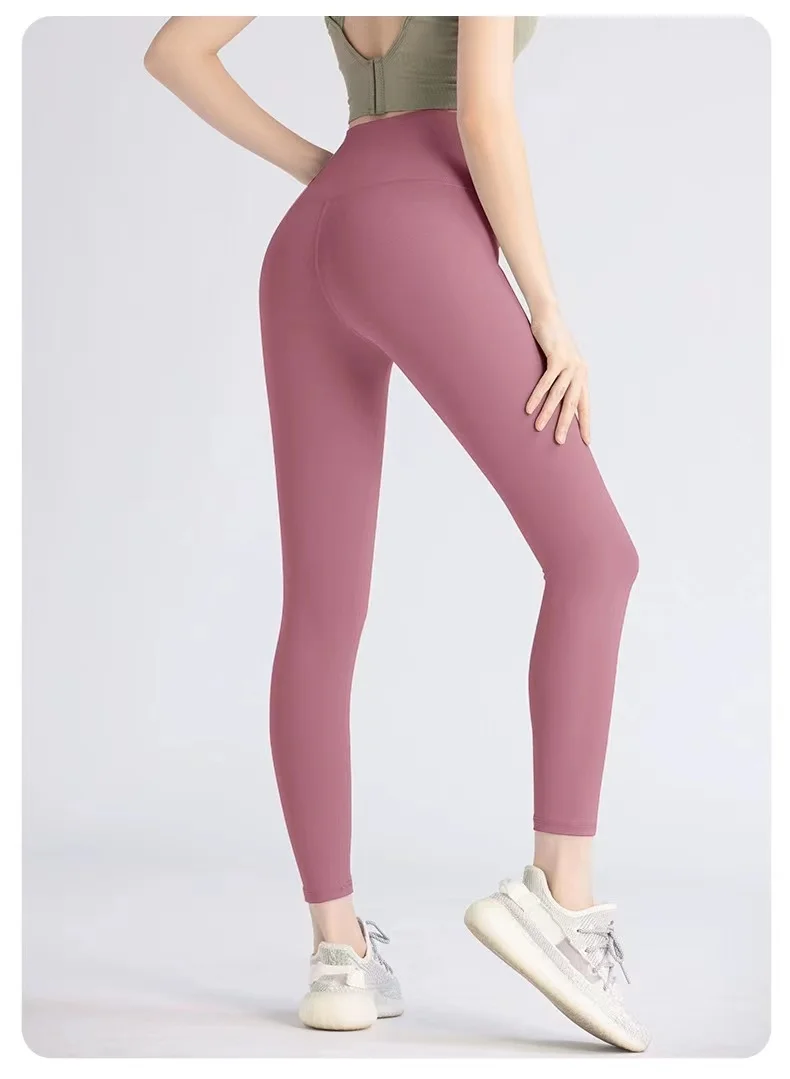 

Honey Peach Hip Lifting Tights High Waist Tight Running Fitness Pants European and American Sports Nude Yoga Pants for Women