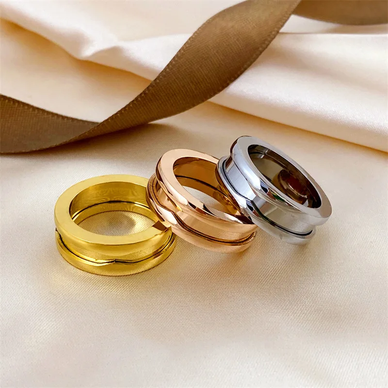 

High quality Little Red Man black ceramic spring ring couples personality fashion narrow version wide version white ceramic ring
