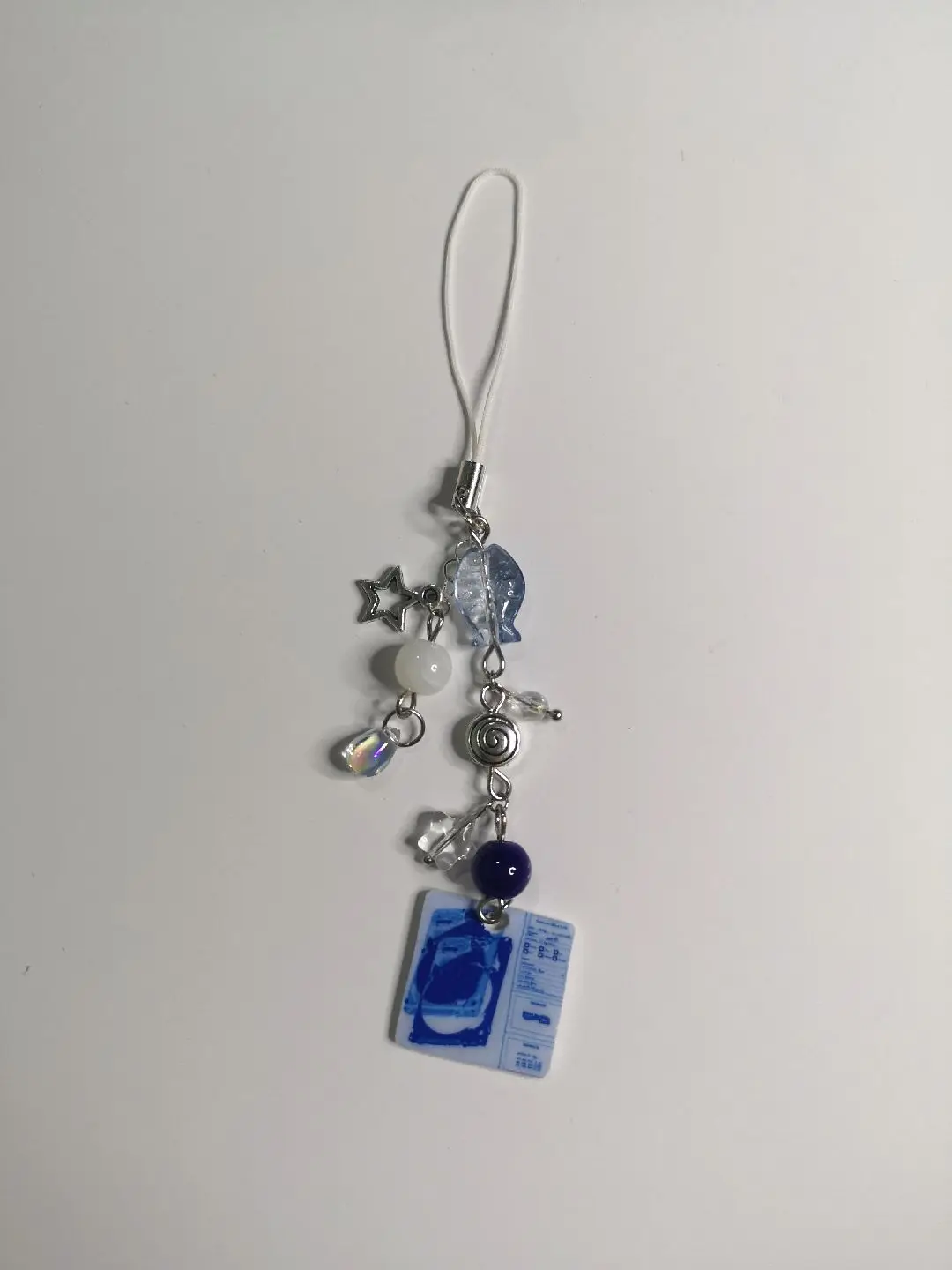 

Handmade wave 2 earth phone charm