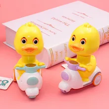 

Little yellow duck motorcycle, a little duck toy that will run when you press it kids toys Free shipping Cute toy