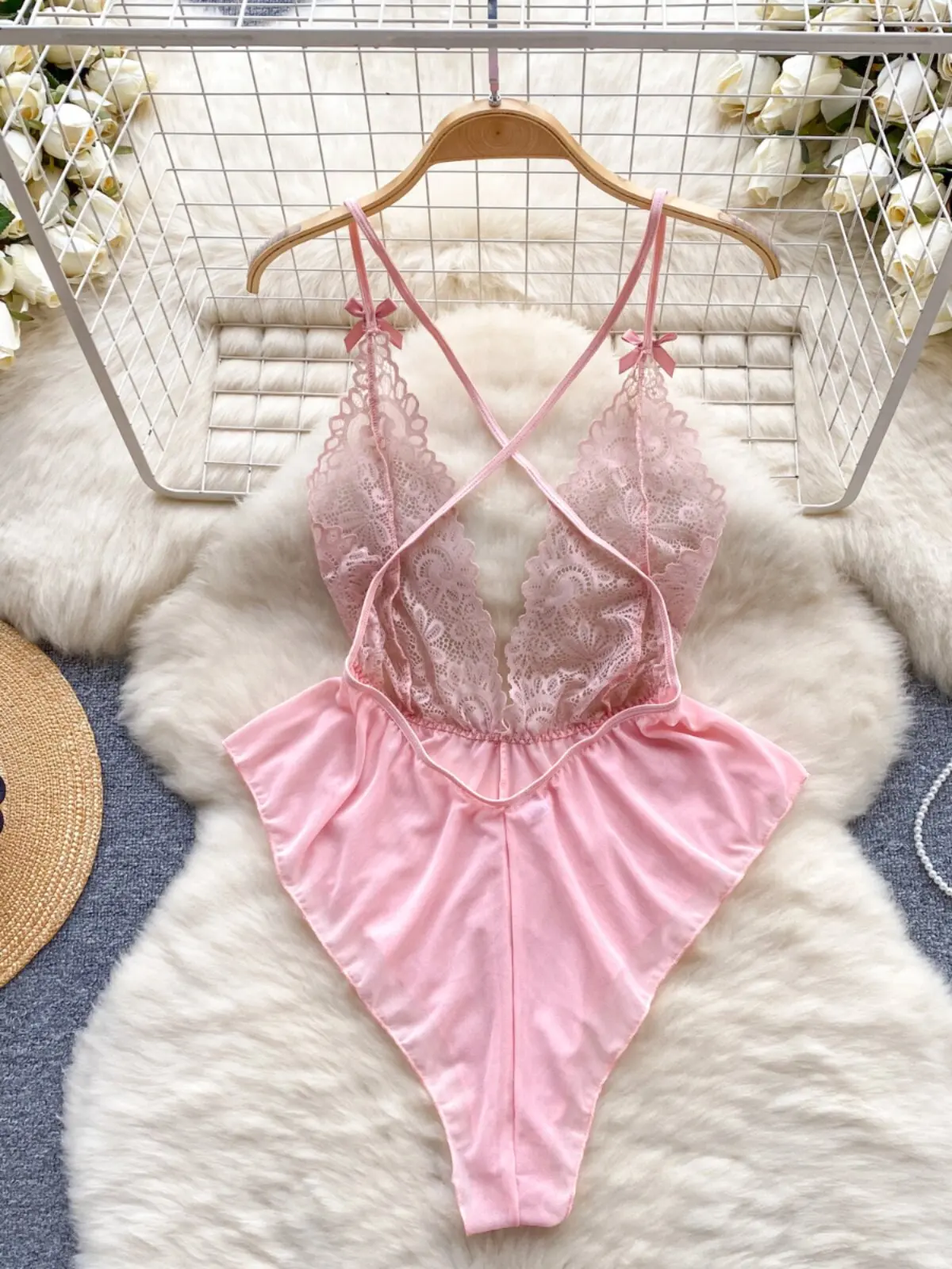 lightweight lace bodysuit displayed on hanger