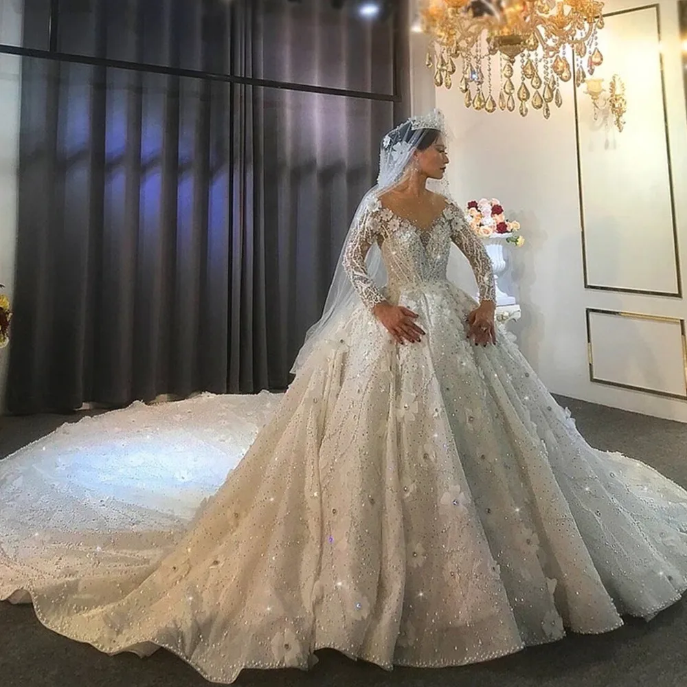 Luksusowe koraliki suknia ślubna iluzja koronkowe cekiny suknie ślubne z długimi rękawami 3D kwiatowy suknie ślubne Vestido De Novi