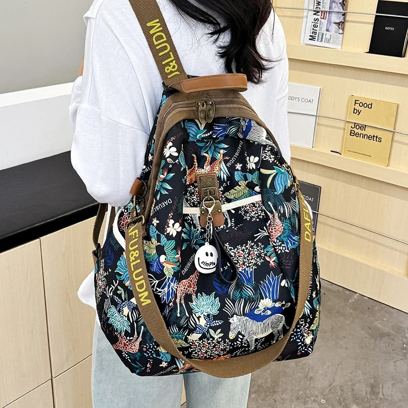 thumbnail image 1 of Nueva mochila de tela de nailon para mujer, bolsos escolares de moda para adolescentes, bolso de hombro de alta calidad, mochila de viaje multifunción, 1 of 4