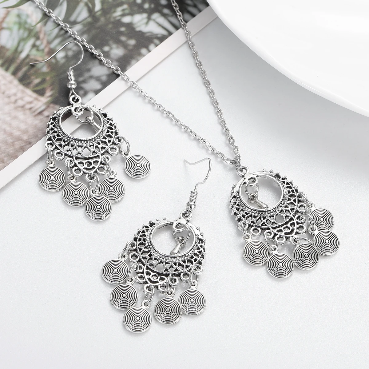 Geometric Deco tassel earrings in silver main image 1