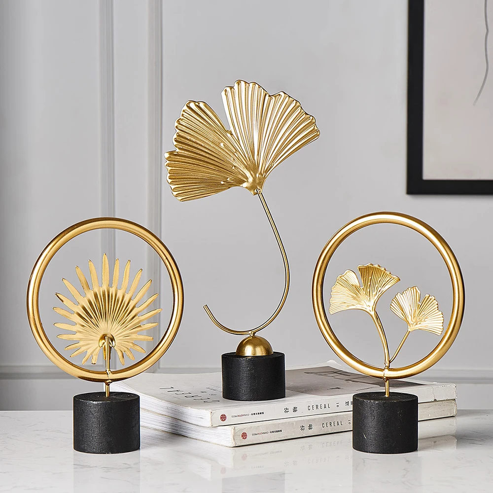 https://ae01.alicdn.com/kf/S33db77e4335e4537953c81f43cec3cb5V/Modern-home-decoration-office-accessories-for-living-room-piecies-home-decor-statues-Leaves-Statue-miniature-metal.jpg