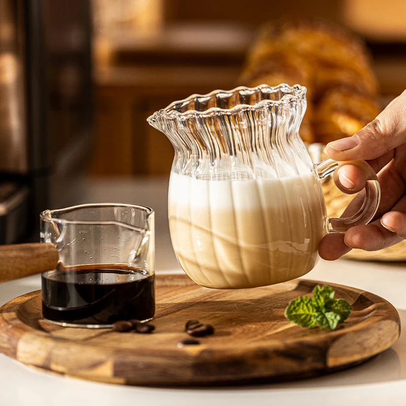 https://ae01.alicdn.com/kf/S33f69e72ca9b45a9a5ca70b6e6ec17b3Q/YWDL-Nordic-Transparent-Glass-Coffee-Milk-Jug-Set-With-Handle-Espresso-Coffee-Frothing-Cup-Tea-Pitcher.jpg