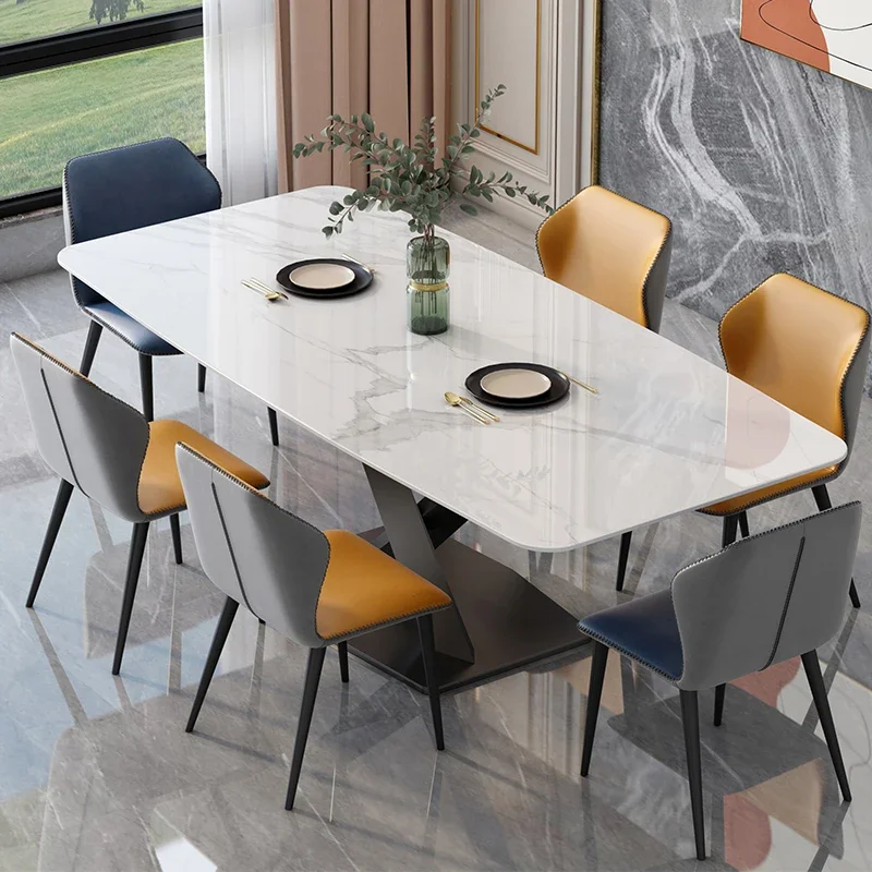 

Italian luxury imported rock plate dining table and chair combination modern Nordic simple household small-sized marble dining t