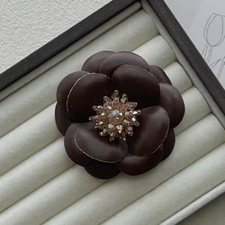Elegant Camellia Crystal Brooch with PU Leather Floral Design - Stylish Lapel Pin Accessory (Brown)