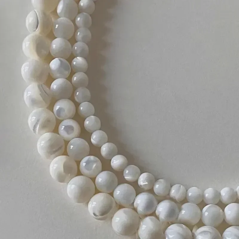 Minar Elegant Natural Shell Beaded Necklace with Silver-Plated Chain