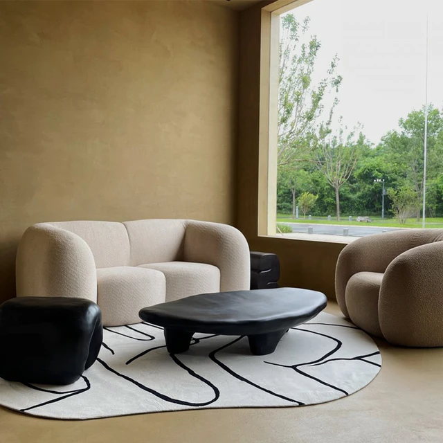 Table basse ovale noire de style moderne, forme de pierre créative, table d'appoint minimaliste de designer pour la décoration du salon 1