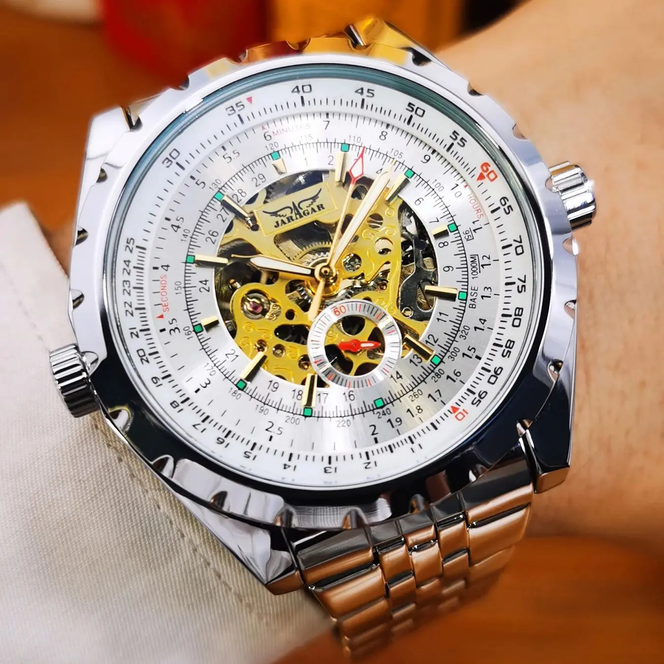 Luxury JARAGAR Men's Skeleton Mechanical Watch with Luminous Hands and Leather-Steel Strap