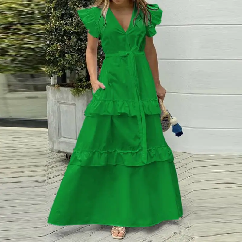 This dress features a comfortable and stylish design with a belted waist, perfect for everyday wear.