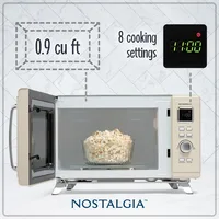Nostalgia Mid-Century Retro Countertop Microwave Oven,900-Watt, 0.9 cu ft, 8 Pre-Programmed Cooking Settings,Digital Clock,Cream 2