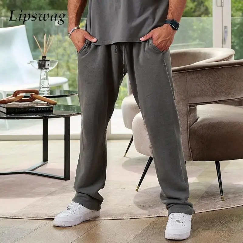 

2023 Autumn Fashion Cotton Pants Men Casual Solid Color Loose Lace-up Straight Sweatpants Mens Sports Fitness Trouser Streetwear