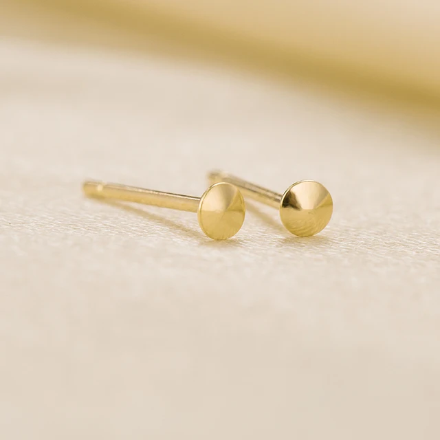 Delicate and unique, the Domino Handmade 14K Solid Gold Invisible Super Small Earring Tragus Stud Tiny Studs Simple Unique are the perfect accessory to elevate your style.