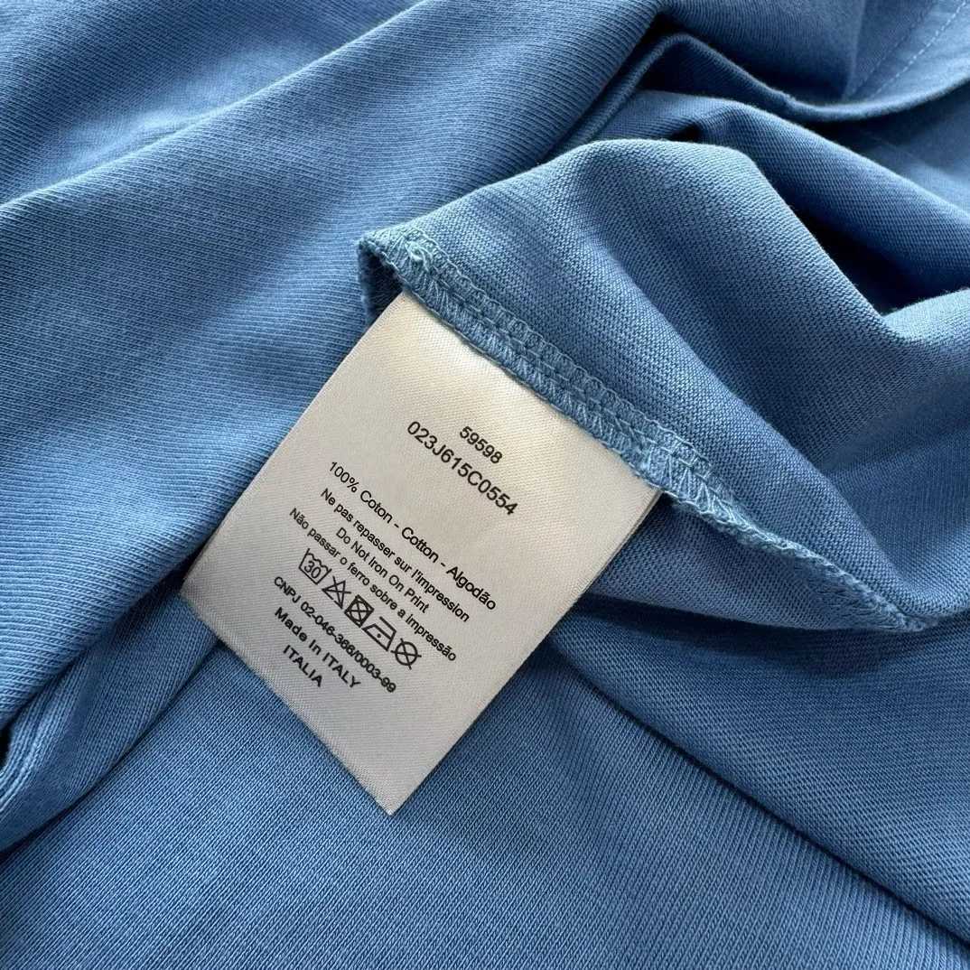 

New 24ss high quality beach series washed hole letter print T-shirt for men and women loose version