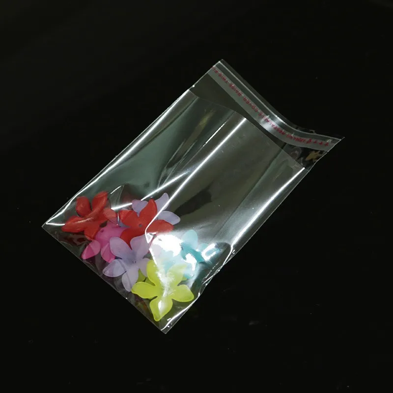 100pcs transparent OPP self-adhesive glass paper bag, self sealing packaging bag for candy, biscuits, toys and party gifts 6