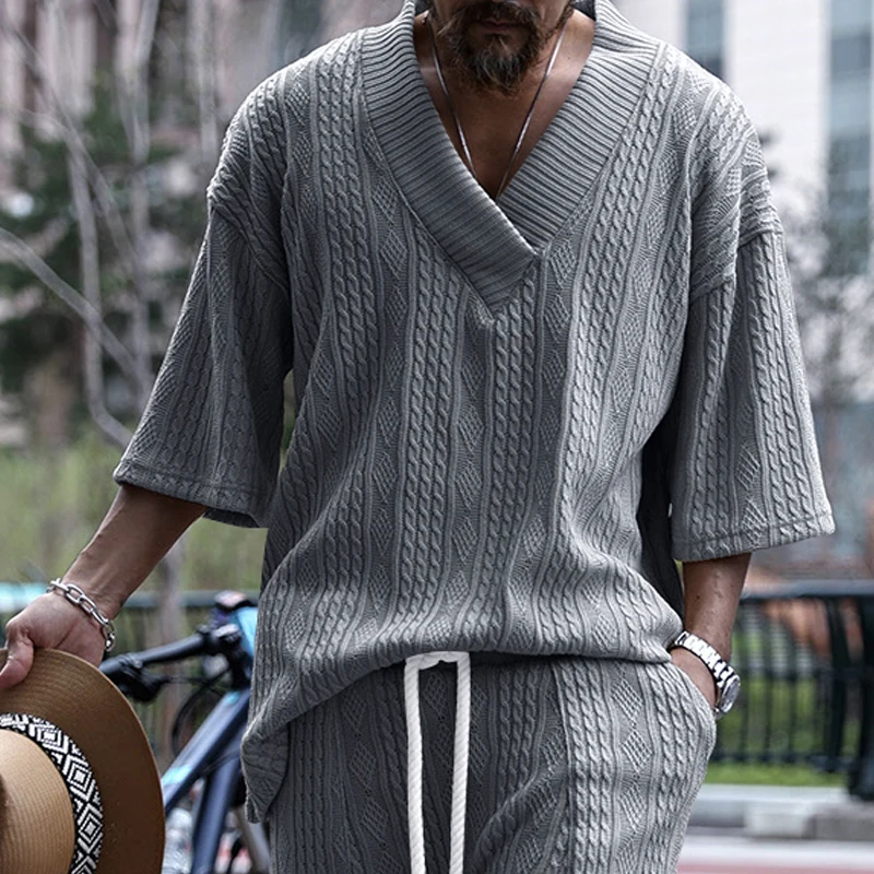 Spring and autumn new European and American men's jacquard loose knitting solid color leisure V-neck long sleeve sweater