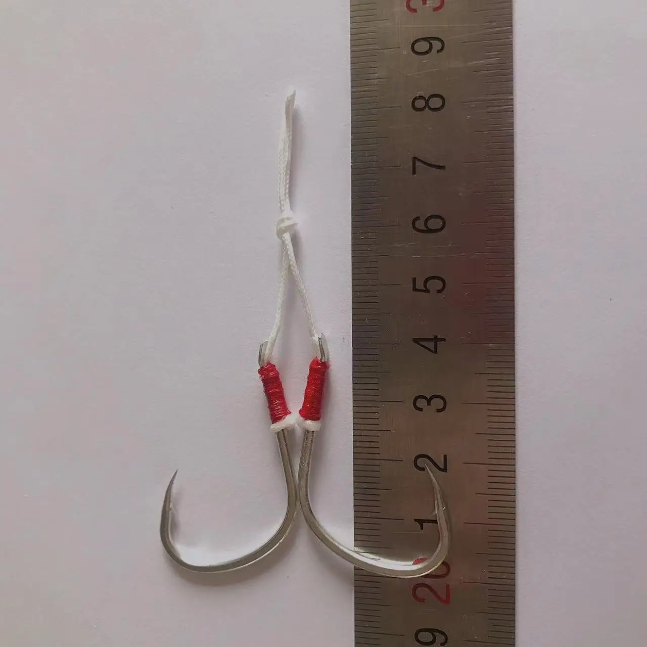 

20Pcs/lot Metal Jig Assist Hook with PE Line Solid Ring Jigging Spoon Saltwater Fishhook Corrosion and Seawater Resistance