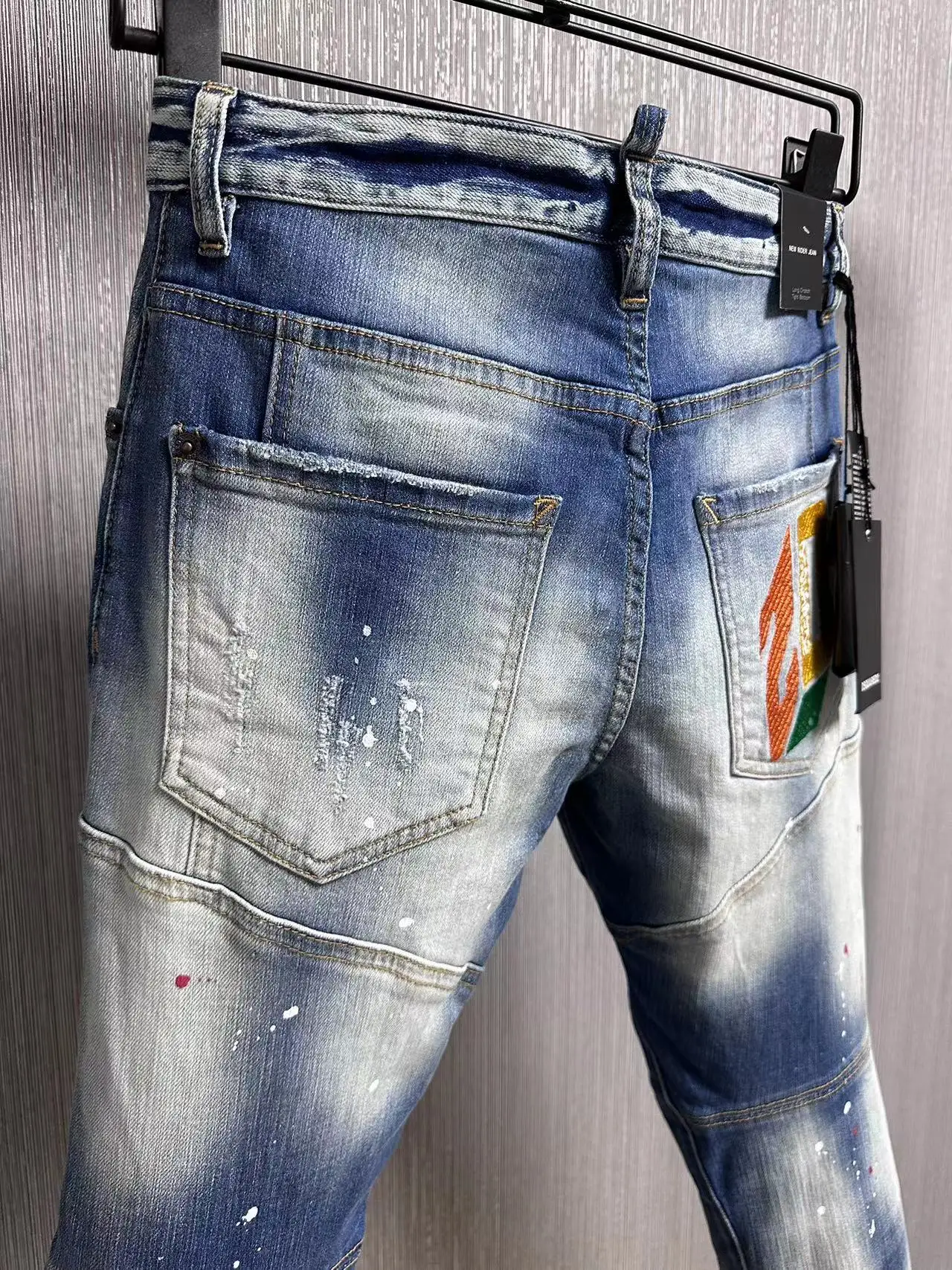 2024 Spring/Summer New Trendy Men's Water Wash Worn Hole Patch Paint Personalized Button Feet D2 Jeans for Men