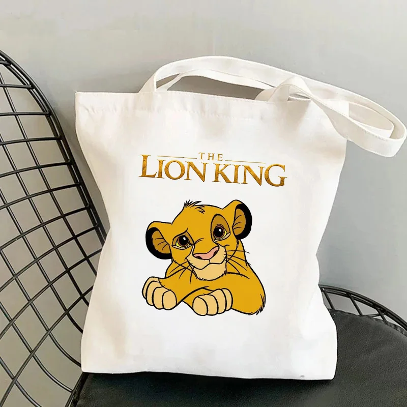 thumbnail image 1 of Bolso de mano de lona estilo años 90 Y2k de Disney El Rey León, bolso de hombro ecológico Hakuna Matata, bolso de compras para mujer, bolso de mano para mujer, 1 of 5