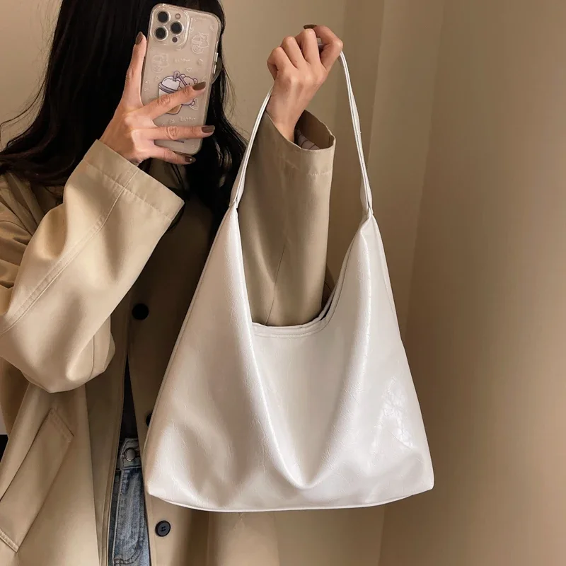 

Free shipping high-quality casual style PU women's bag, fashionable and trendy shoulder bag, simple and large capacity handbag