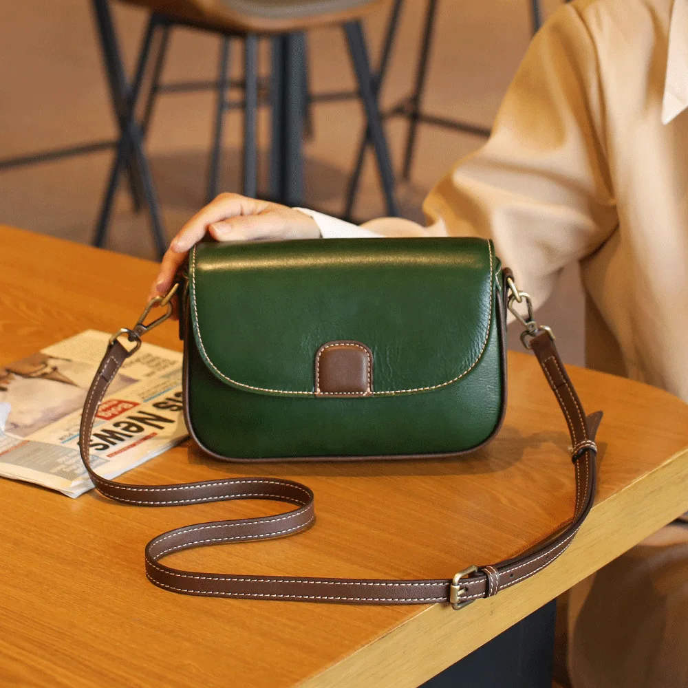 

New fashion leather women's handbag layer vegetable tanned leather shoulder bag contrast color portable slung small bag.